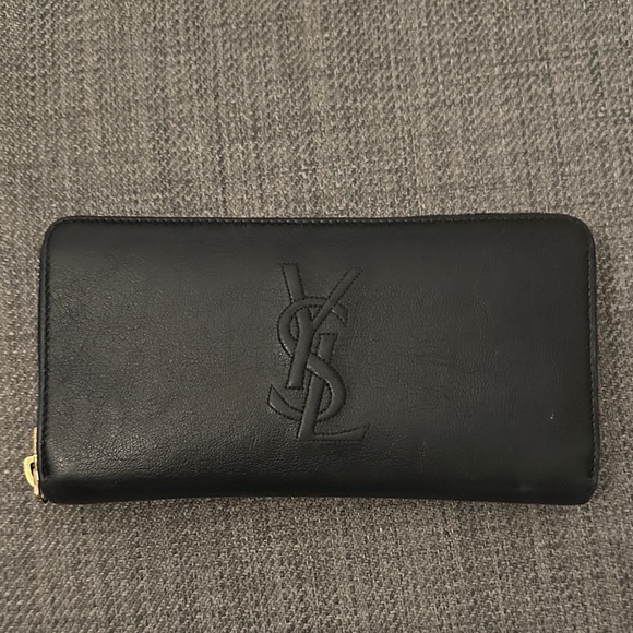 Yves Saint Laurent Black leather wallet with gold zipper - Picture 1 of 4